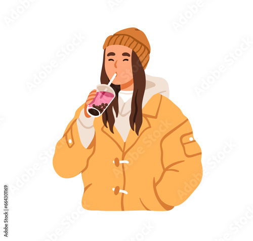 Girl drinking boba, Korean bubble milk tea in takeaway glass with straw. Youn...