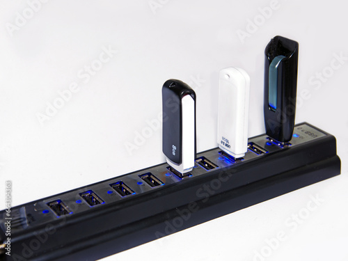 USB hub with connected flash drives. flash drives are connected to a USB hub