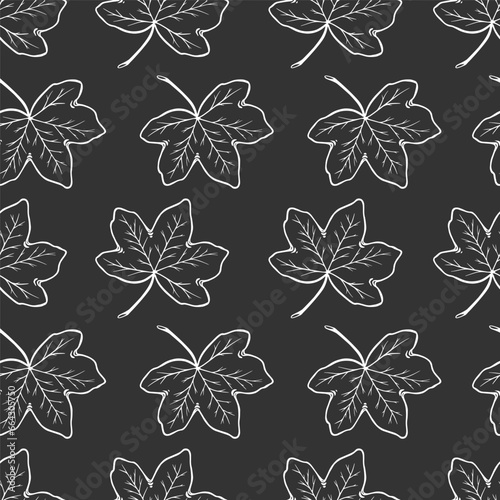 Seamless pattern with autumn maple leaves. In sketch doodle style. On a gray background. Vector.