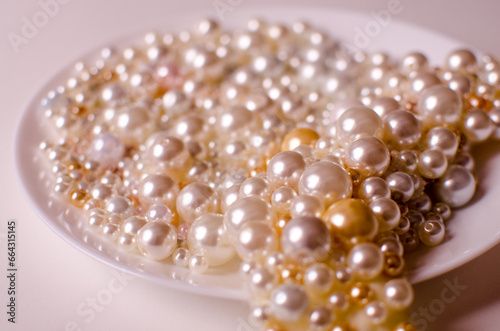 Elegant collection of lustrous pearl white beads, perfect for jewelry and craft projects
