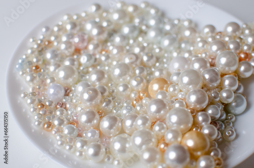 Elegant collection of lustrous pearl white beads, perfect for jewelry and craft projects