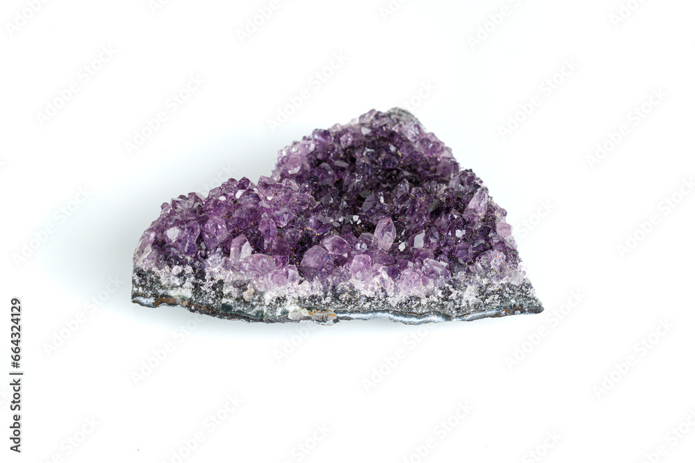 Amethyst mineral stone macro on white background Amethyst mineral stone macro on white background