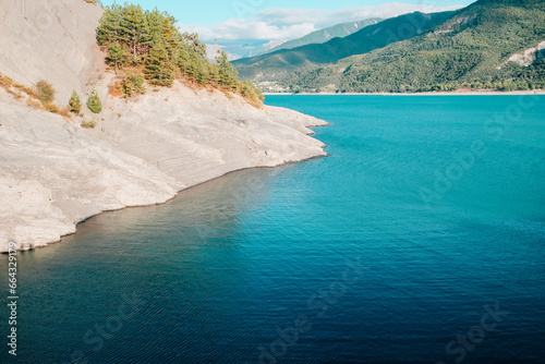 Lake of Serre-Poncon, reservoir and popular nature attraction on the border in the Provence-Alpes-Cote d'Azur region, Southeastern France. photo