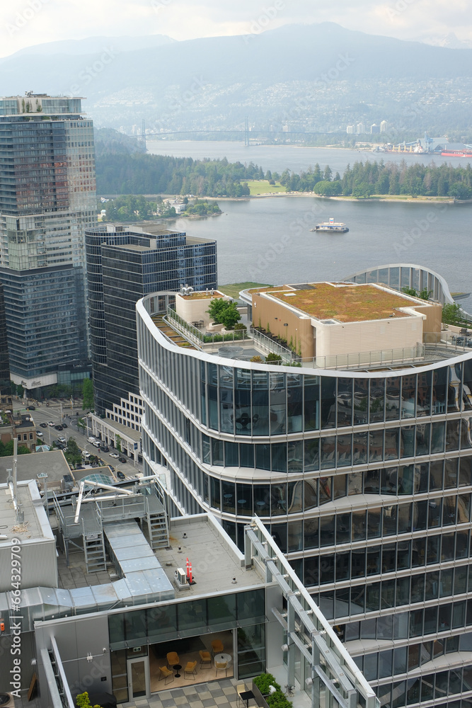 Obraz premium Vancouver, BC Canada Overlooking downtown Vancouver from Top of Vancouver Revolving Restaurant during sunset in summer. High quality
