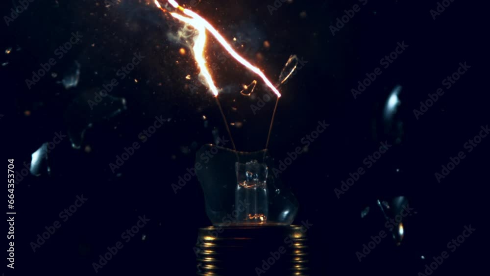 Super slow motion of light bulb explosion isolated on black background. Filmed on super slow motion cinema camera, 2000 fps.