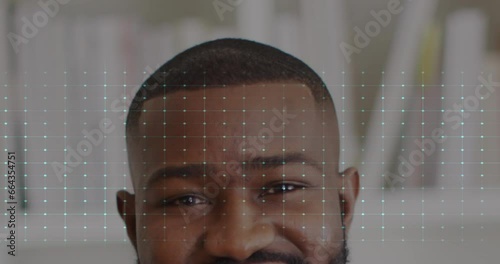 Animation of heart rate monitor against half face portrait of african american male doctor smiling photo