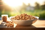 bowl of whole grain cereal lit by morning light