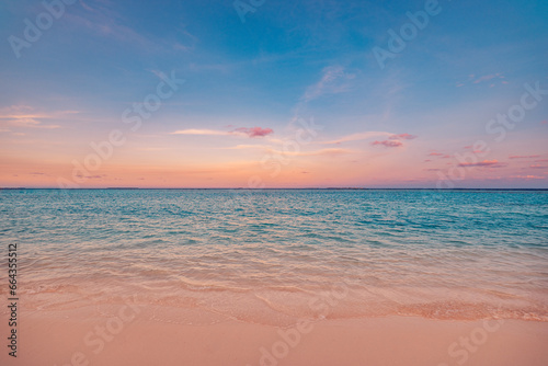 Beach nature closeup. Sea waves sandy coast and colorful dreamlike sky clouds. Relaxing panoramic empty beach landscape copy space  peaceful tranquil calm background. Horizon beautiful natural scene