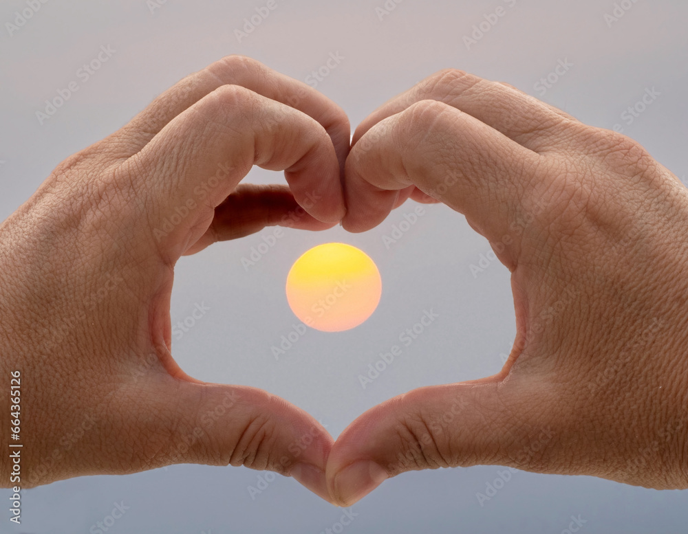 Hands,love and sunset