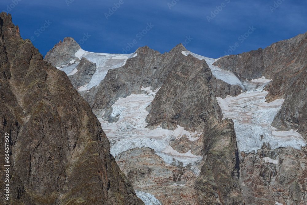 The snow-capped mountains of the Mont Blanc Alps, shot in Val Ferret, near the town of Courmayeur, Aosta Valley, Italy - October 2, 2023.
