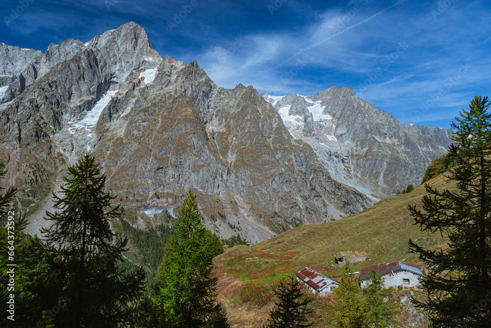 The Grandes Jorasses, one of the massifs of Mont Blanc, more spectacular and majestic of all the Alps, during a sunny autumn day, near the town of Courmayeur, Italy