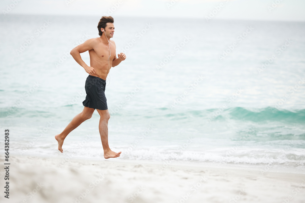 Man, music and running on beach training workout, cardio playlist or summer sport exercise. Male person, streaming listening and fitness at sea or headphones speed performance, healthy body or audio Man, music and running on beach training workout, cardio playlist or summer sport exercise. Male person, streaming listening and fitness at sea or headphones speed performance, healthy body or audio