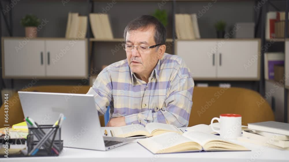 Old man using laptop. Old man using laptop.