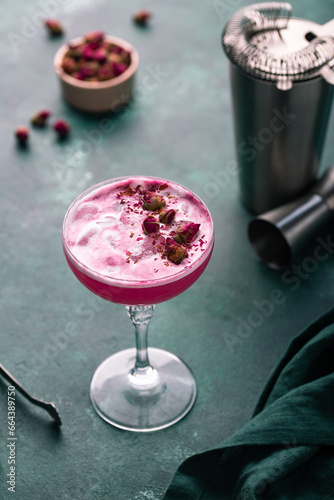 Summer pink cocktail with rose flowers