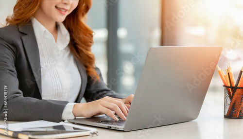 Business woman hands typing on laptop computer keyboard, surfing the internet at the office with copy space for web banner, Woman worker and business concept