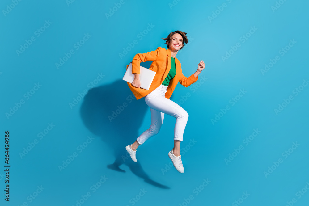 Photo of cheerful active lady entrepreneur manager wear trendy suit go fast hurry office isolated on blue color background - obrazy, fototapety, plakaty 