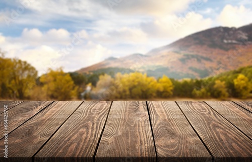 Empty blank wooden table on nature background.