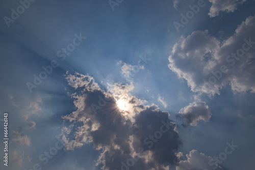 The sun's rays are covered by clouds