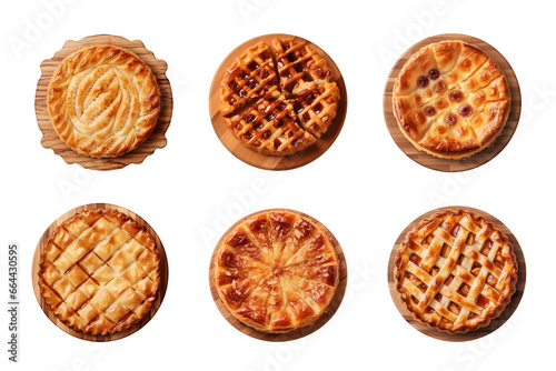 Collection of different tasty pies on wooden board isolated on transparent background, top view