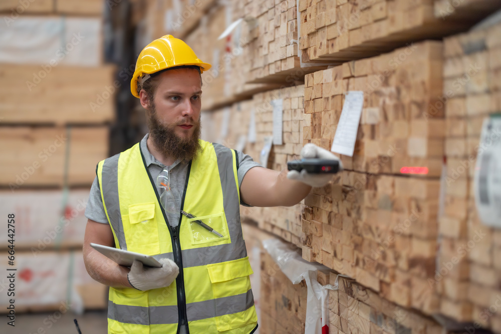 Warehouse staff verify wooded pallets items using handheld device, ensuring precise shipment. - obrazy, fototapety, plakaty 