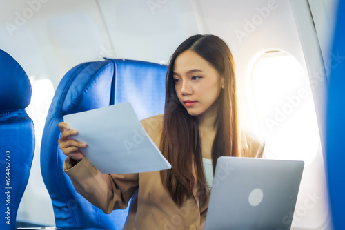 Female airplane passengers, study abroad, asian chinese people, foreign university student passengers preparing for overseas studies. dreams taking flight, global campuses await. english languages