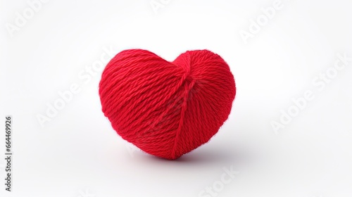Colorful yarn ball isolated on white background. Space for text. Red heart like a symbol of love. Hobby concept