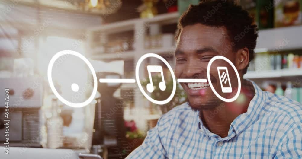 Animation of flowchart of icons over smiling biracial man scrolling on smartphone
