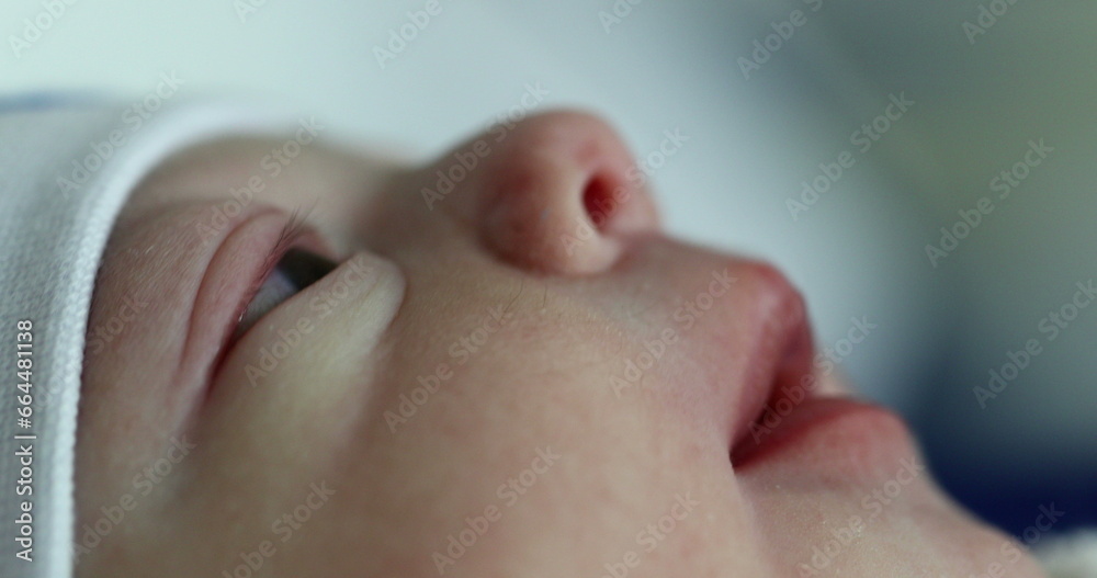 Baby newborn face in first minutes of life Baby newborn face in first minutes of life