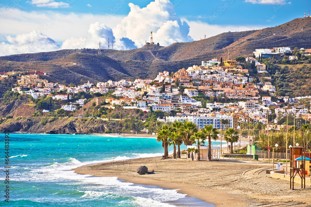Town of Nerja turquoise sand  beach view