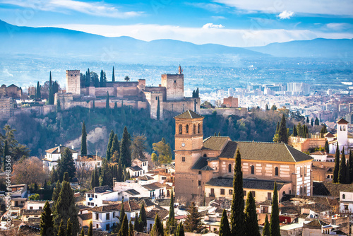 Ancient Alhambra and Sierra Nevada mountain view, UNESCO world heritage site in Granada