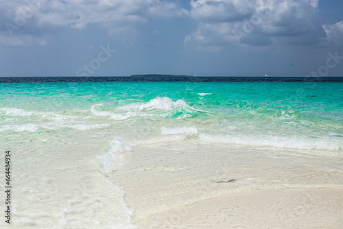 Fototapeta Naklejka Na Ścianę i Meble -  Beautiful beach at Zanzibar. Paradise beach with blue water in Kendwa village, Zanzibar, Tanzania