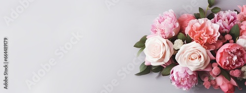 Fresh bunch of pink peonies and roses with copy space. © MDBaki