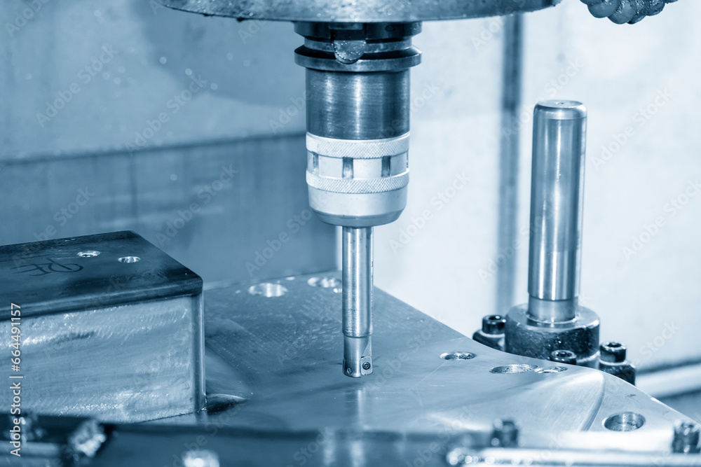 The CNC milling machine rough cutting the injection mold parts by indexable tools. The CNC milling machine rough cutting the injection mold parts by indexable tools.
