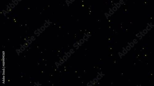 Alpha channel video of tiny particles slowly moving through space like stars or fireflies