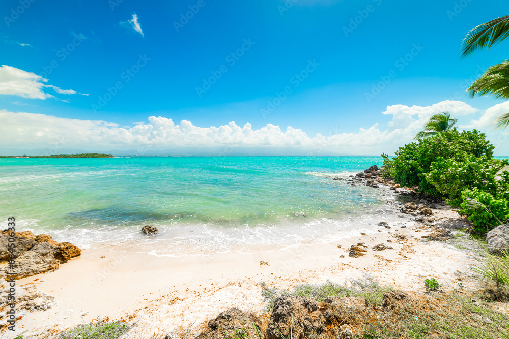 Clear water and blue sky in Bas du Fort beach in Guadeloupe
