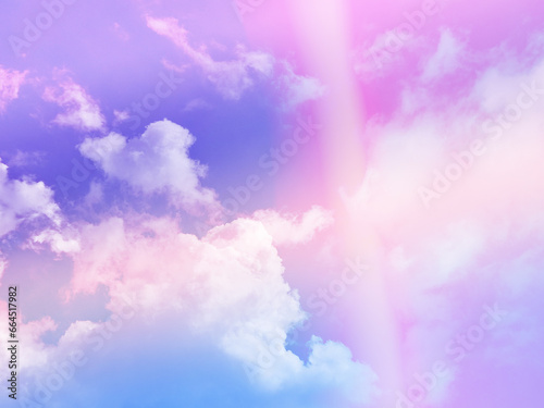 beauty abstract sweet pastel soft blue and violet with fluffy clouds on sky. multi color rainbow image. fantasy growing light