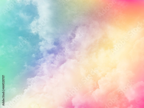 beauty abstract sweet pastel soft orange and green with fluffy clouds on sky. multi color rainbow image. fantasy growing light
