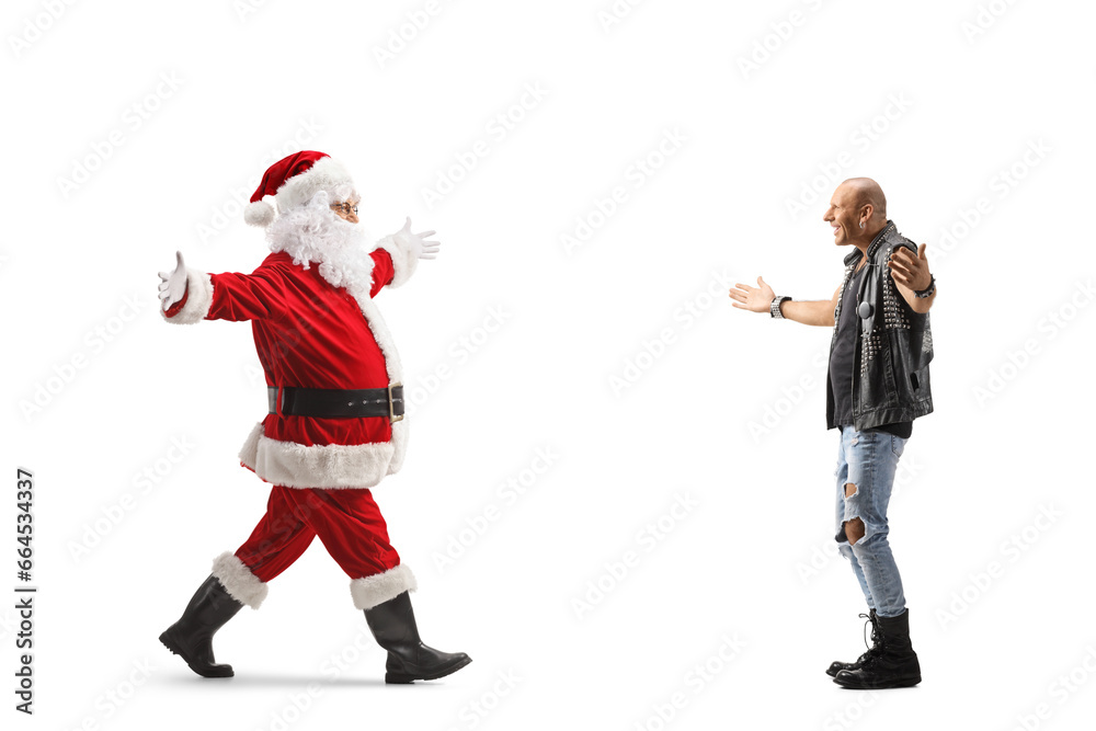 Full length profile shot of a punk waiting for santa claus with arms wide open