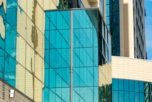 Curved reflection in mirrored stained glass windows