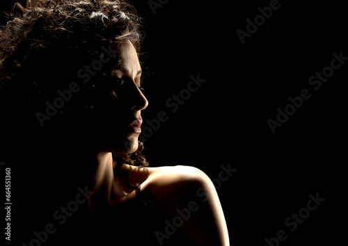 Sensual Profile Silhouette Portrait on Dark Background photo