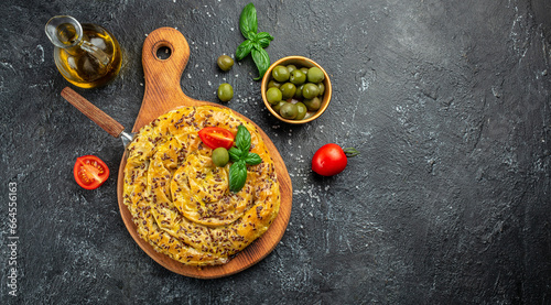 burek pie with meat on a dark background. Long banner format. top view photo