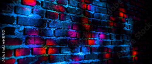 Old textured brick wall with neon lights