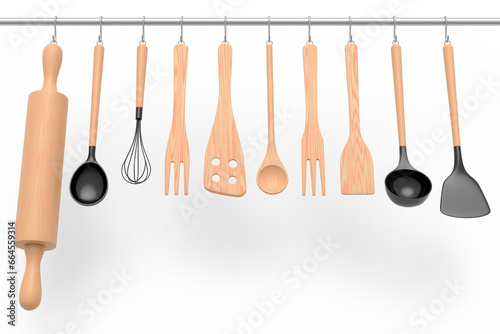 Set of kitchen utensil for preparation of dough hanging on shelf on white.