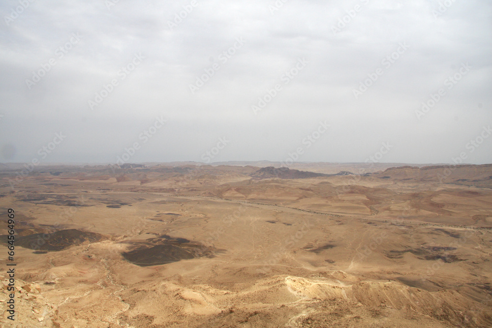 Open Negev Desert in South Israel. Sand dunes with dry air on a summer day.