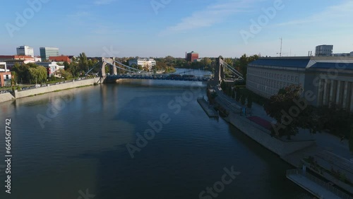 Scenic Grunwald Bridge. A Picturesque Suspension Bridge Over the River in Wroclaw, Poland at summer time with blue sky