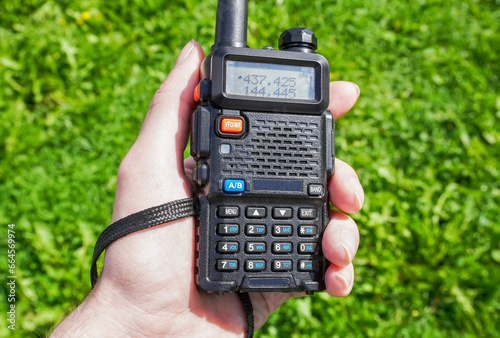 Portable radio transceiver in hand