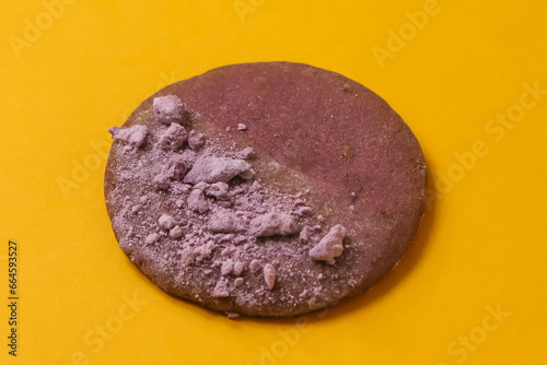 Lavender cookies on a yellow background. Close-up
