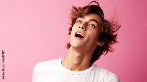 A whimsical teenage boy, isolated on a pink background, reveling in playful imagination, showcasing moments of whimsy.