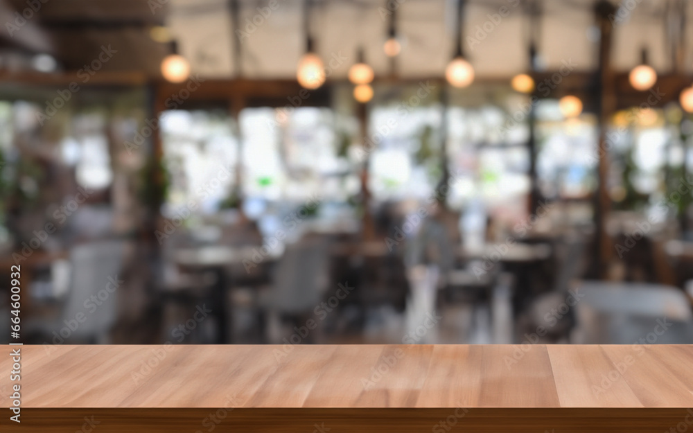 Photo of empty wooden table, where you can add your cup of coffee or some decoration. Focus on the table and blur on the background. Photo of empty wooden table, where you can add your cup of coffee or some decoration. Focus on the table and blur on the background.