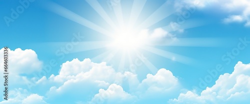 Sunny background, blue sky with white clouds and sun. © MstHafija